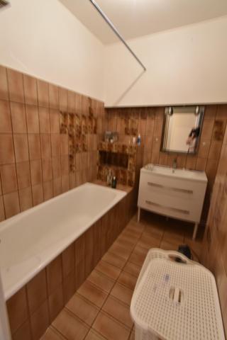 A découvrir appartement en RDC d'une petite copropriété à proximité des commerces et transport