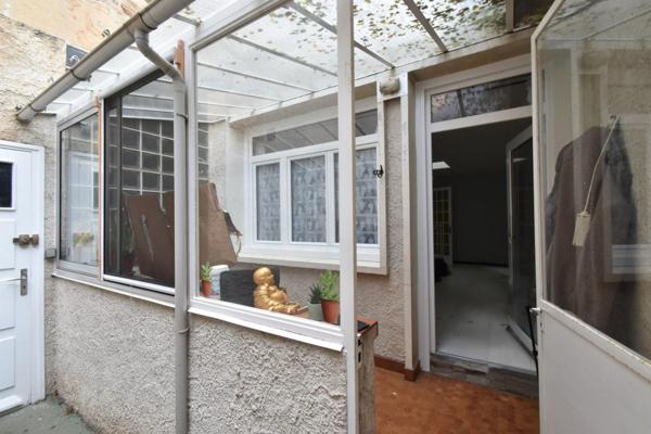 A découvrir appartement en RDC d'une petite copropriété à proximité des commerces et transport