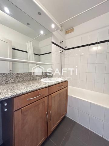 Appartement 3 pièces de 64 m², triple exposition sans vis à vis, 2 chambres, parking, cave