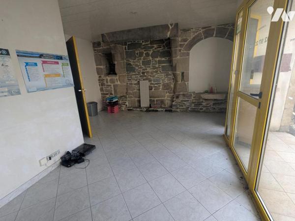 IMMEUBLE A USAGE D'HABITATION ET DE COMMERCE