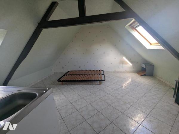 IMMEUBLE A USAGE D'HABITATION ET DE COMMERCE