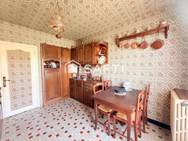 Maison à fort potentiel dans un environnement calme