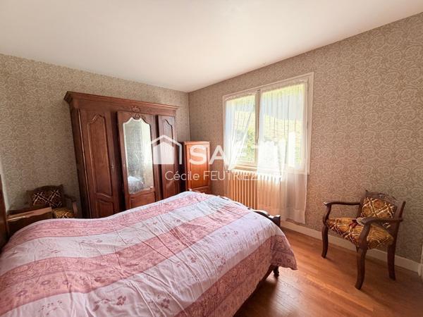 Maison à fort potentiel dans un environnement calme