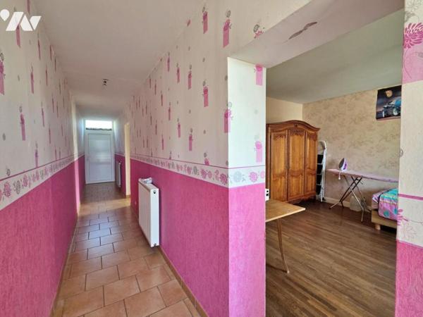 Maison de village avec exploitation agricole