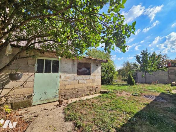 Maison de village avec exploitation agricole