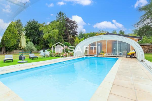 MAISON DE 385 M2 ET PARC ARBORE DE 4700 M2