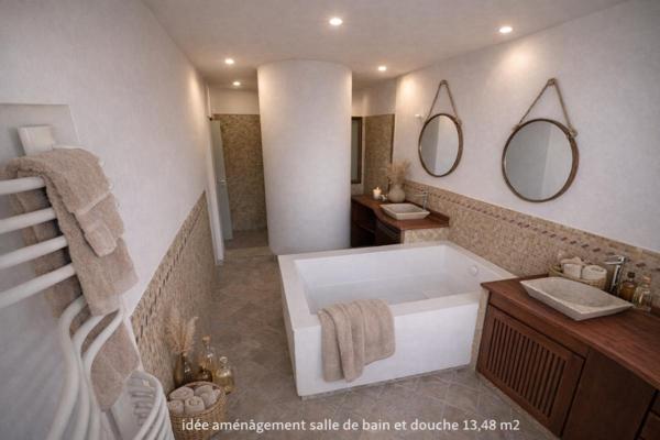 BEAUREGARD . Duplex 4 pièces 109m2 habitables + terrasse, cave et 2 places de stationnement