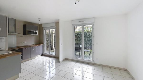 Appartement de type F2 avec jardin