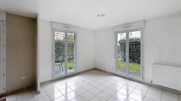 Appartement de type F2 avec jardin