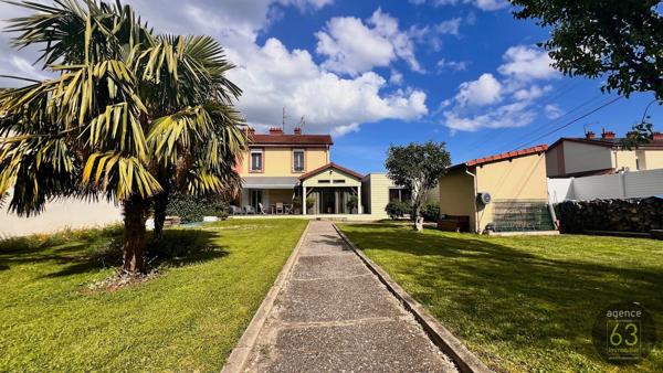 Maison Coup de coeur avec beau terrain de 536 m2 clos et arboré, piscinable, garage, abri et cave