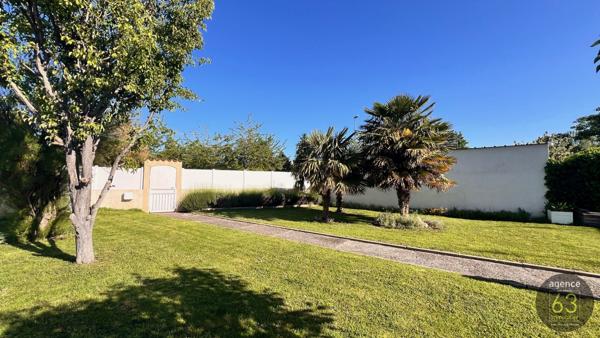 Maison Coup de coeur avec beau terrain de 536 m2 clos et arboré, piscinable, garage, abri et cave