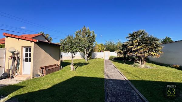 Maison Coup de coeur avec beau terrain de 536 m2 clos et arboré, piscinable, garage, abri et cave