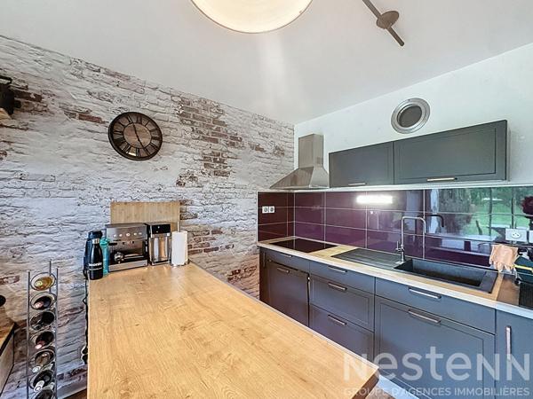 Rez-de-jardin soigné, 1 chambre - jardin et parking - Kervignac