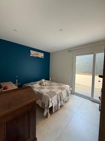 Cadre paisible, grande terrasse en L, appartement moderne