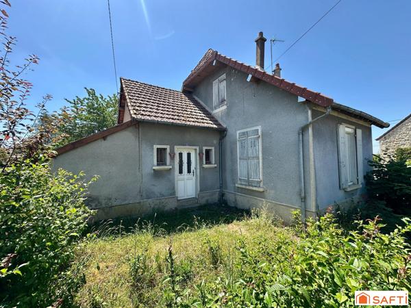 Maison mitoyenne avec 2 chambres, à rénover