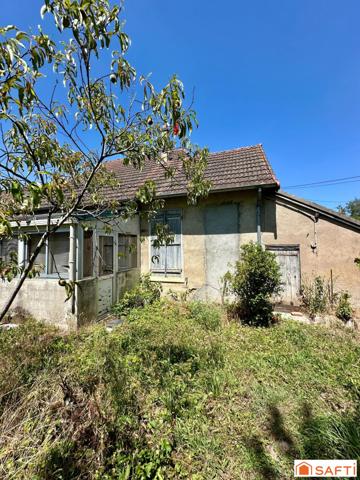Maison mitoyenne avec 2 chambres, à rénover