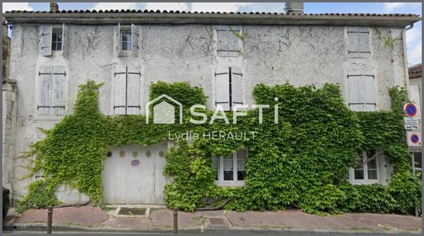 Maison de ville spacieuse idéalement située dans le centre historique de COGNAC