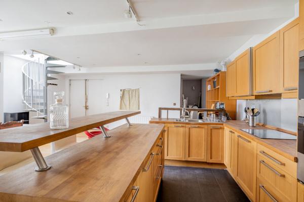 Loft Paris 19 3 pièce(s) 115 m2 au sol