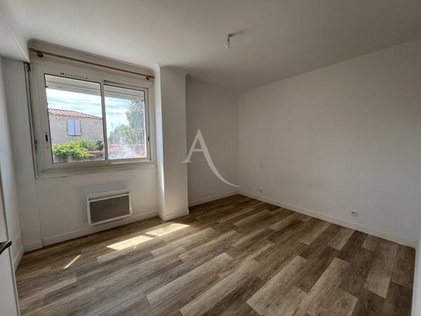 Immeuble de 2 appartements + 1 grange
