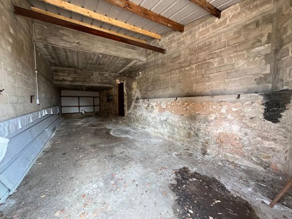 Immeuble de 2 appartements + 1 grange
