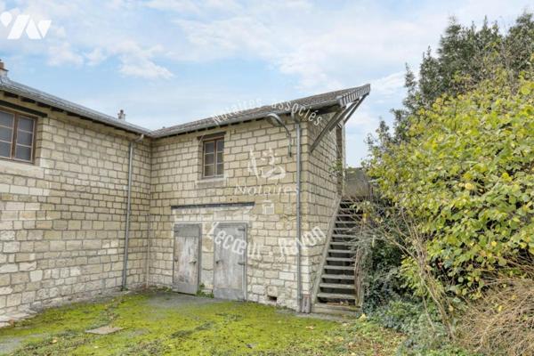 Local professionnel de 335 m2 et maison familiale sur un terrain de 950 m2 parc de Maisons Laffitte 