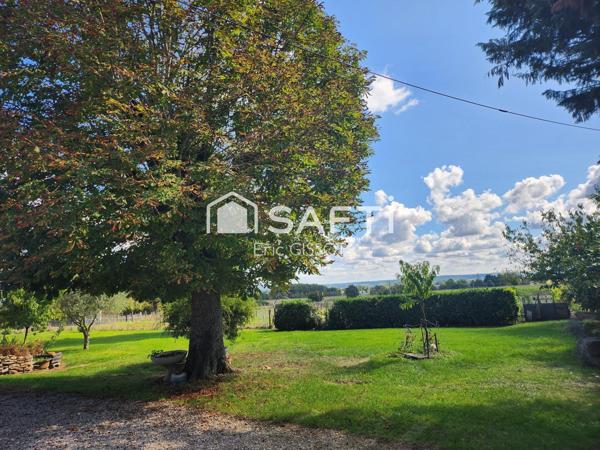 Maison T4 avec dépendances et beau terrain.