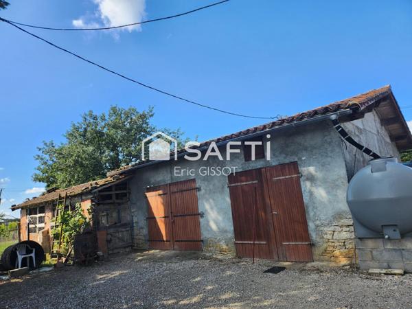 Maison T4 avec dépendances et beau terrain.