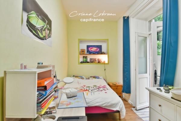 A vendre appartement en rez-de-jardin - 3 chambres