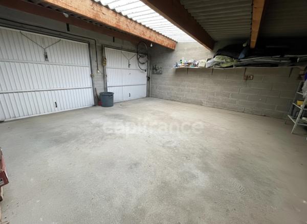 MAISON INDIVIDUELLE 4 CHAMBRES ET 3 GARAGES