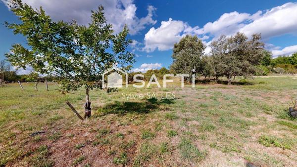 Terrain agricole avec bâtiment