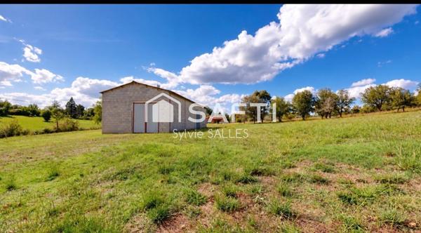 Terrain agricole avec bâtiment