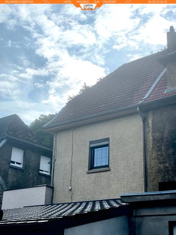 Maison jumelée d'un coté