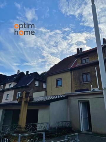 Maison jumelée d'un coté