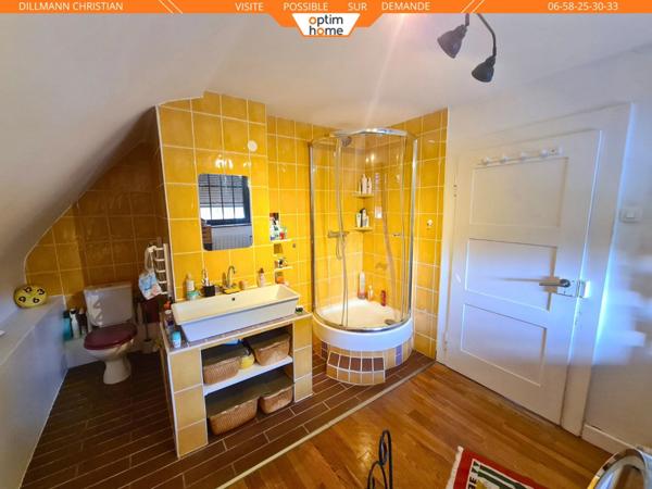 Maison jumelée d'un coté