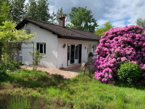 Plain-pied avec sous-sol complet, garage et jardin