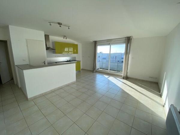 Appartement Concarneau 3 pièces 61 M² avec ascenseur, parking sous-sol, et balcon proche commodités