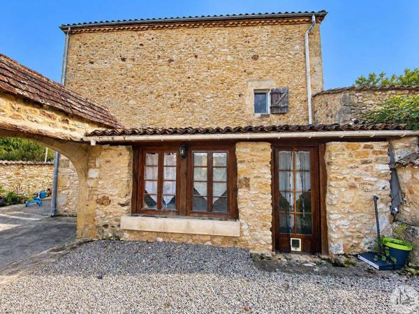 Maison en pierres, jardin, garage et dépendances