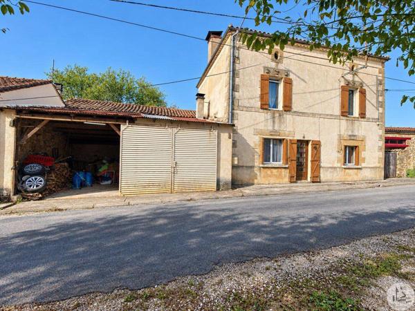 Maison en pierres, jardin, garage et dépendances