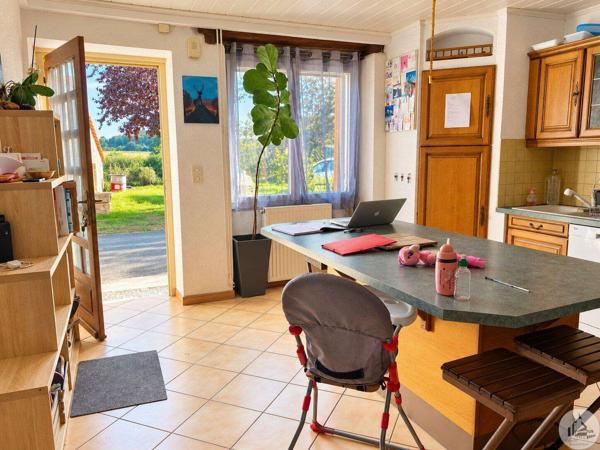 Maison en pierres, jardin, garage et dépendances
