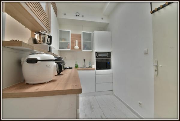 Appartement rénové avec jardin privatif – Vendu entièrement meublé 1 pièces NIMES (30)