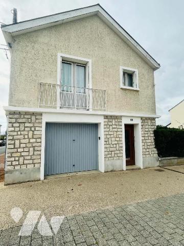 Maison avec jardin et garage 