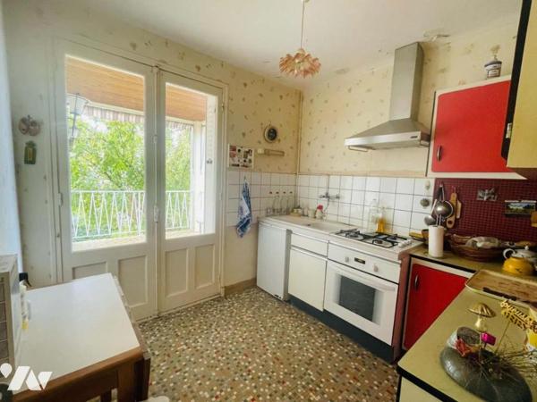 Maison avec jardin et garage 