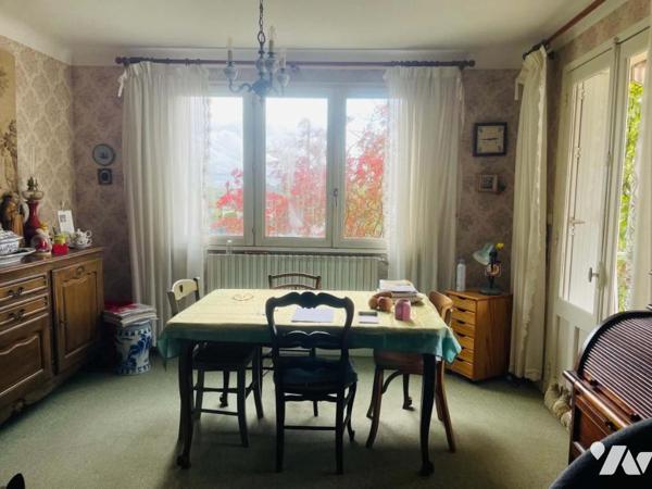 Maison avec jardin et garage 