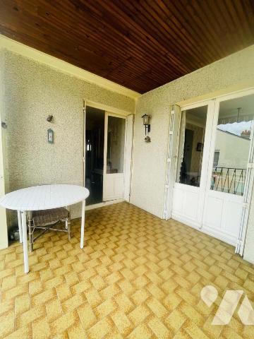 Maison avec jardin et garage 
