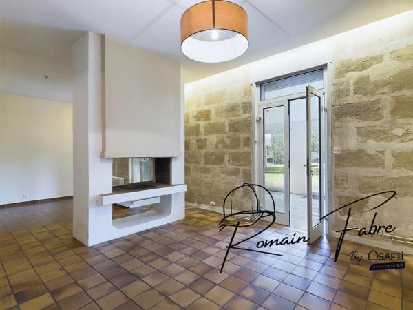 Immeuble avec Logements de 5 chambres et 2 commerces loués centre Cavignac, rentabilité importante