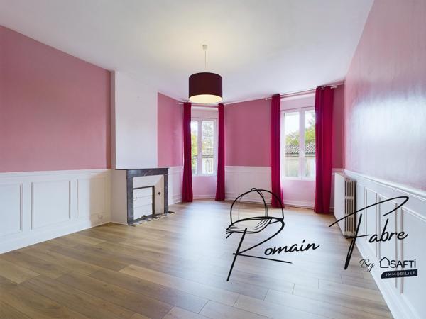 Immeuble avec Logements de 5 chambres et 2 commerces loués centre Cavignac, rentabilité importante