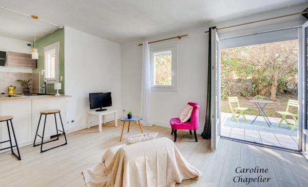 Grand T2 de 52m², terrasse, jardin, parking privatif