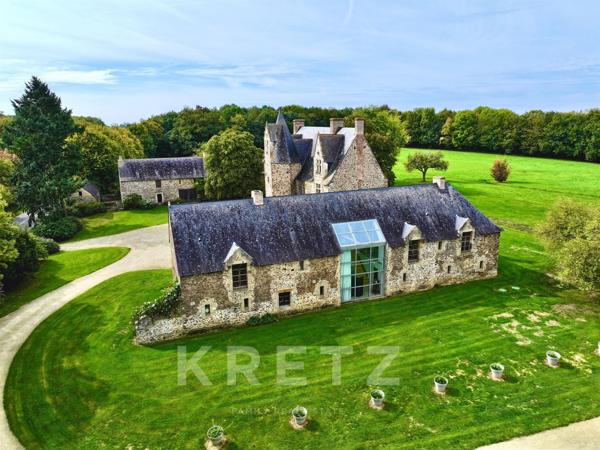 Manoir du XVe IMH, dépendances restaurées, étang 3.5ha avec île sur 18Ha