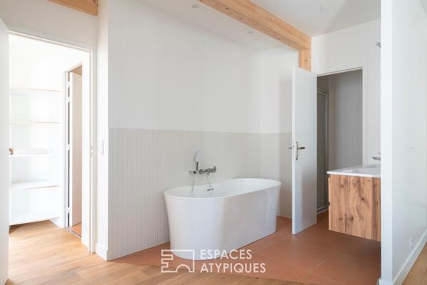 Duplex à l’esprit loft avec jardin