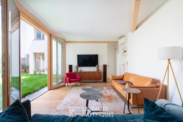 Duplex à l’esprit loft avec jardin